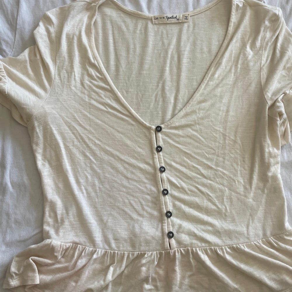 Cream top size xs from Kohl’s.